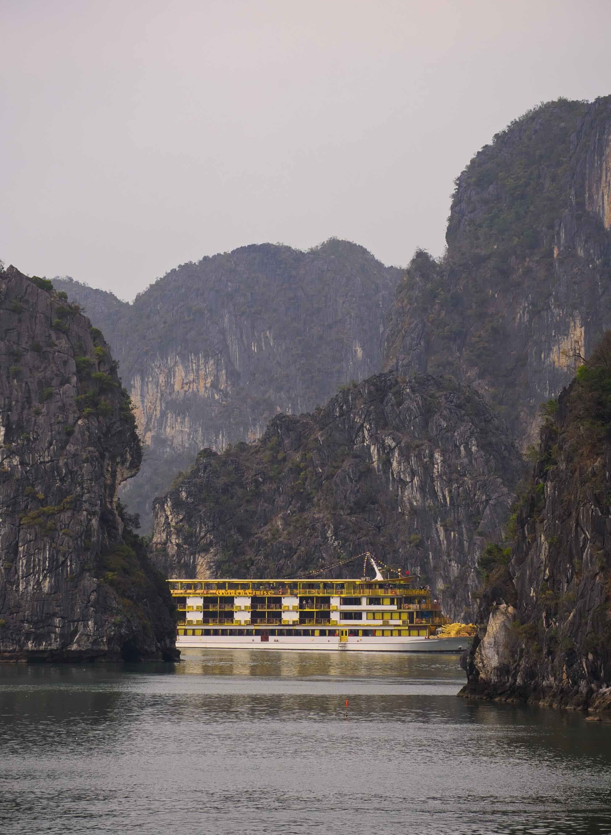 Yellow boat in Ha Long Bay