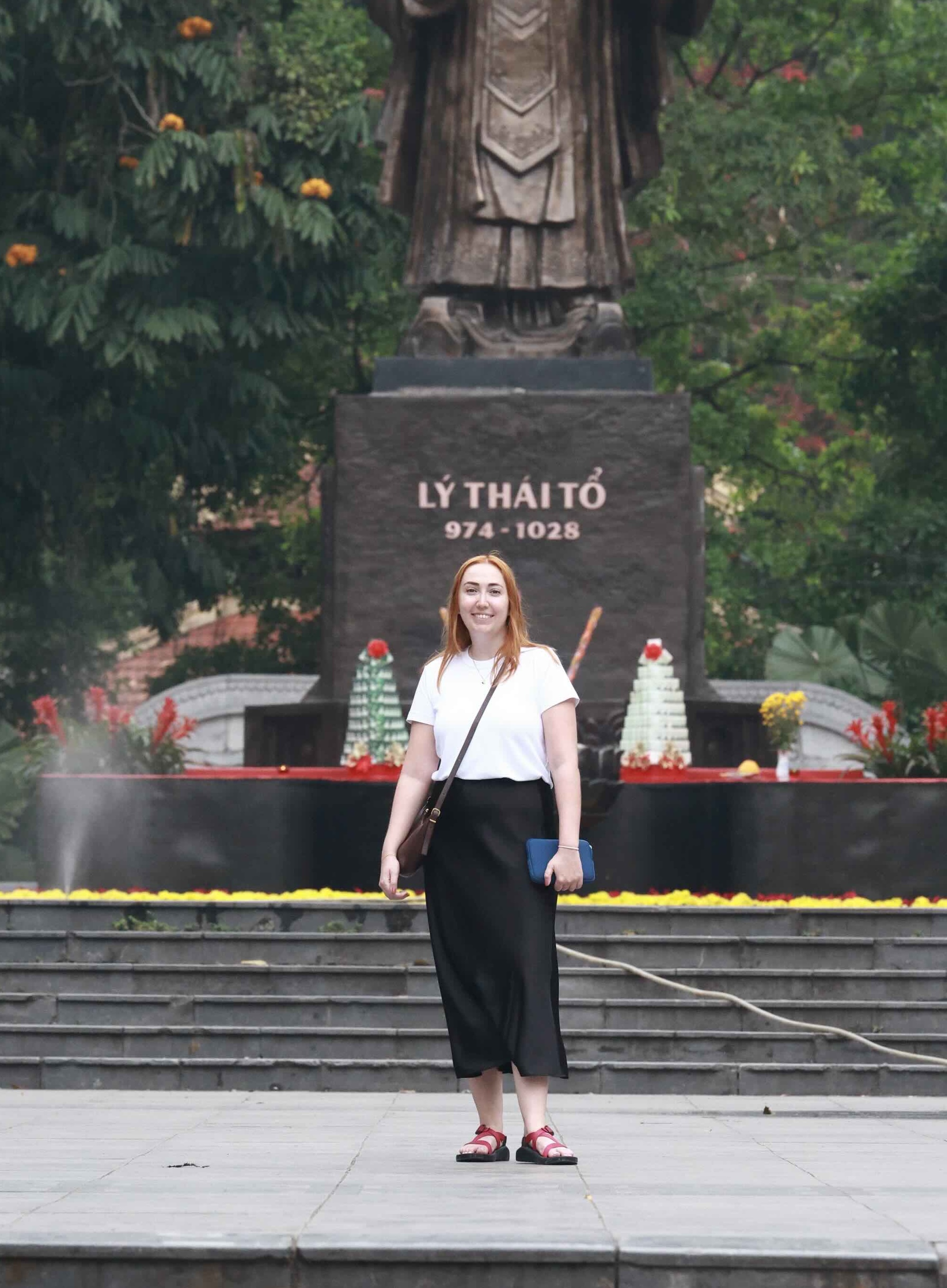 Statue with Erin in Hanoi
