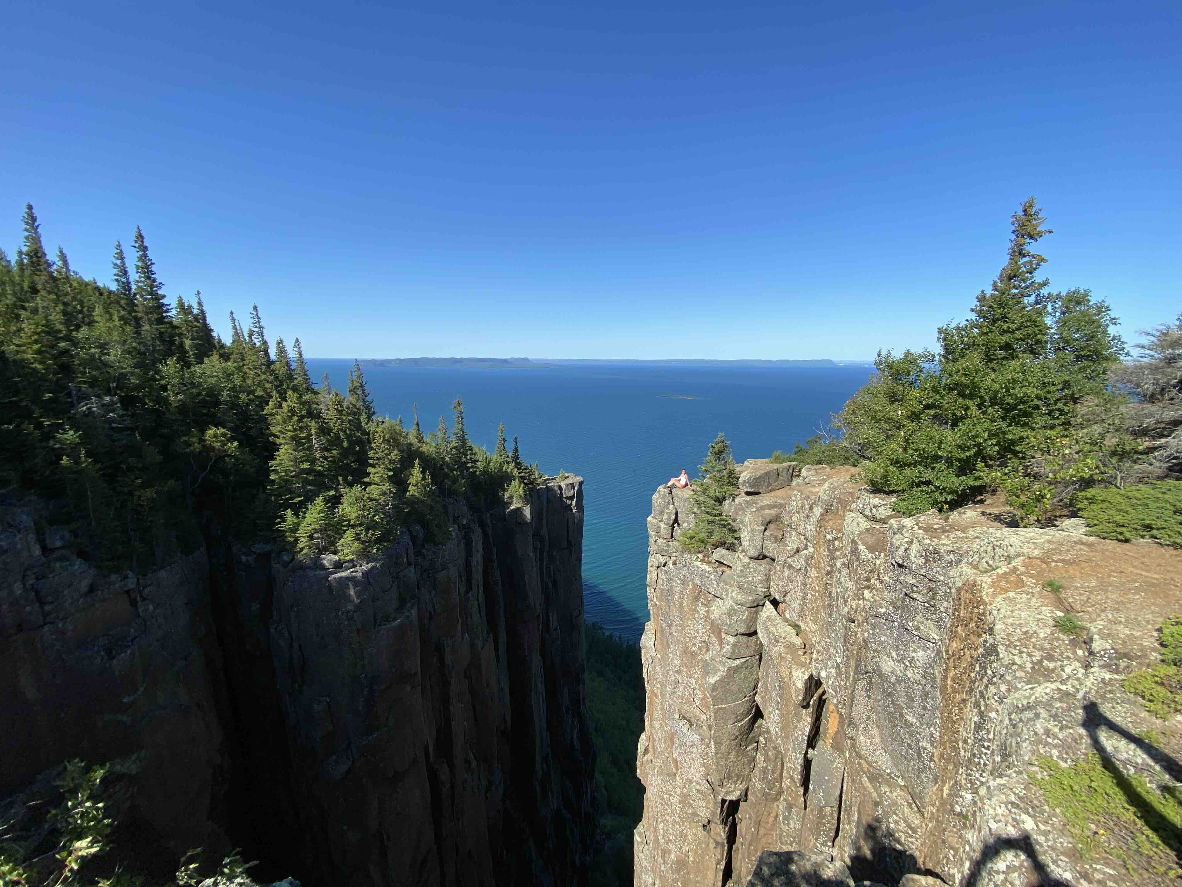 Sleeping Giant Cliffs with small girl in distance